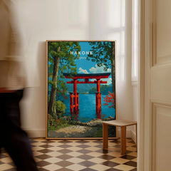 Hakone Japan Lake Ashi Torii Gate Poster - Floating Gate Wall Art as a framed canvas leaning in a hallway with a chequered tiled floor