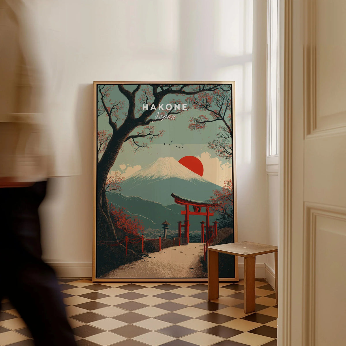 Hakone Japan Torii Gate Mount Fuji Print - Iconic Japanese Poster as a framed canvas leaning in a hallway with a chequered tiled floor