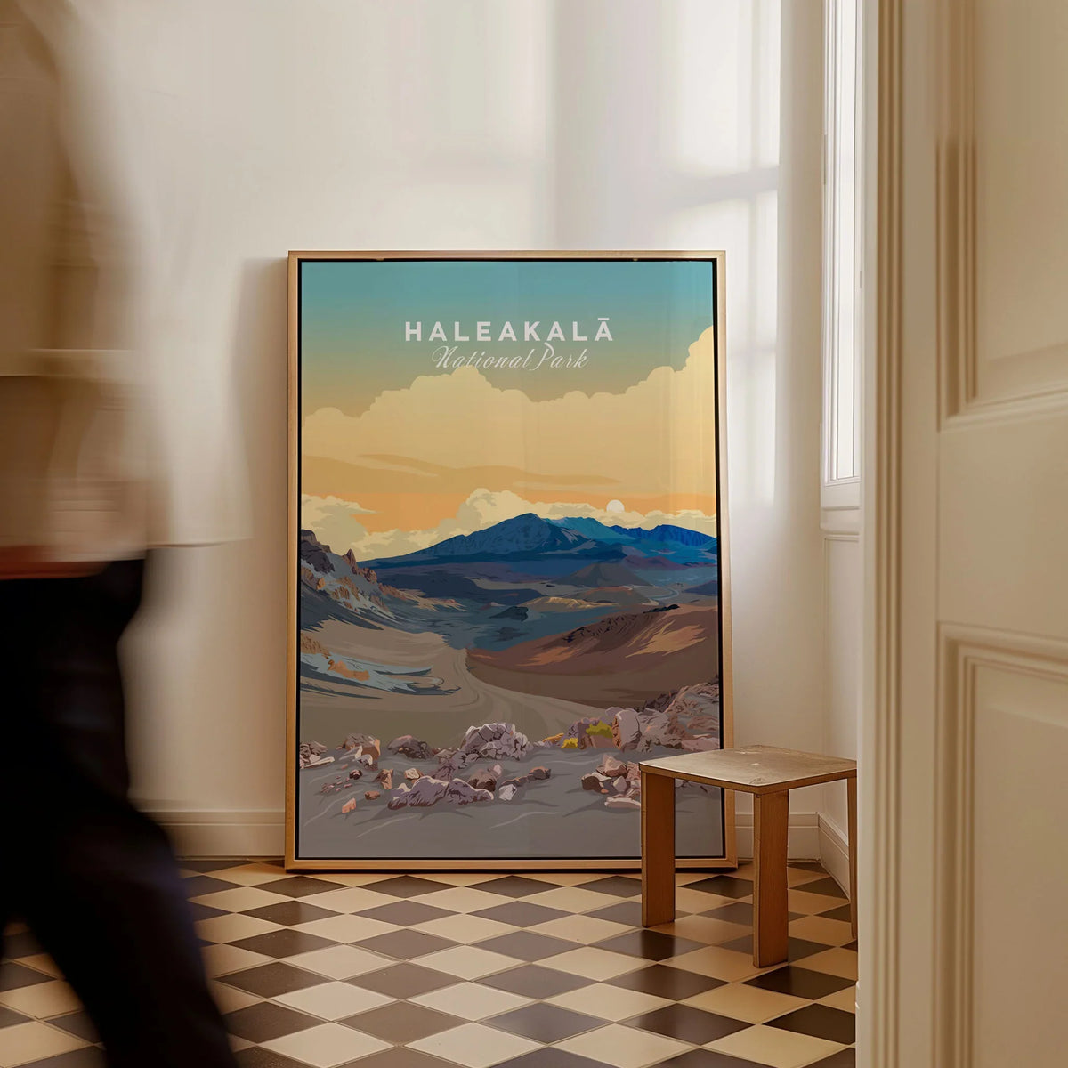 Haleakalā Volcano Poster, Maui Hawaii Travel Print, National Park Wall Art as a framed canvas leaning in a hallway with a chequered tiled floor