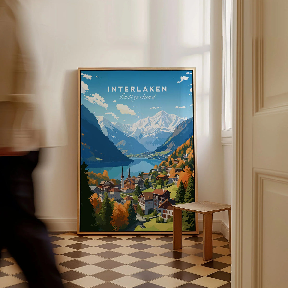Interlaken Poster as a framed canvas leaning in a hallway with a chequered tiled floor