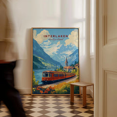 Interlaken Travel Print as a framed canvas leaning in a hallway with a chequered tiled floor