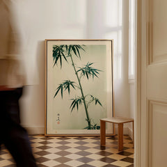 Green Bamboo Art Print – Japanese Botanical Wall Art — framed canvas on floor man walking past