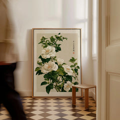 White Camellia Art Print – Vintage Japanese Botanical Wall Art — framed canvas on floor man walking past