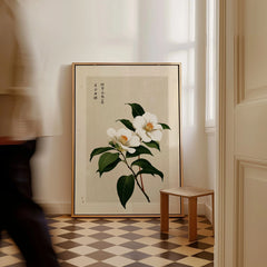 Camellia Art Print – Vintage Japanese Flower Wall Art — framed canvas on floor man walking past
