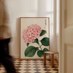 Pink Hydrangea Art Print – Vintage Japanese Botanical Wall Art — framed canvas on floor man walking past