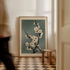 White Plum Blossom Art Print – Japanese Botanical Wall Art — framed canvas on floor man walking past