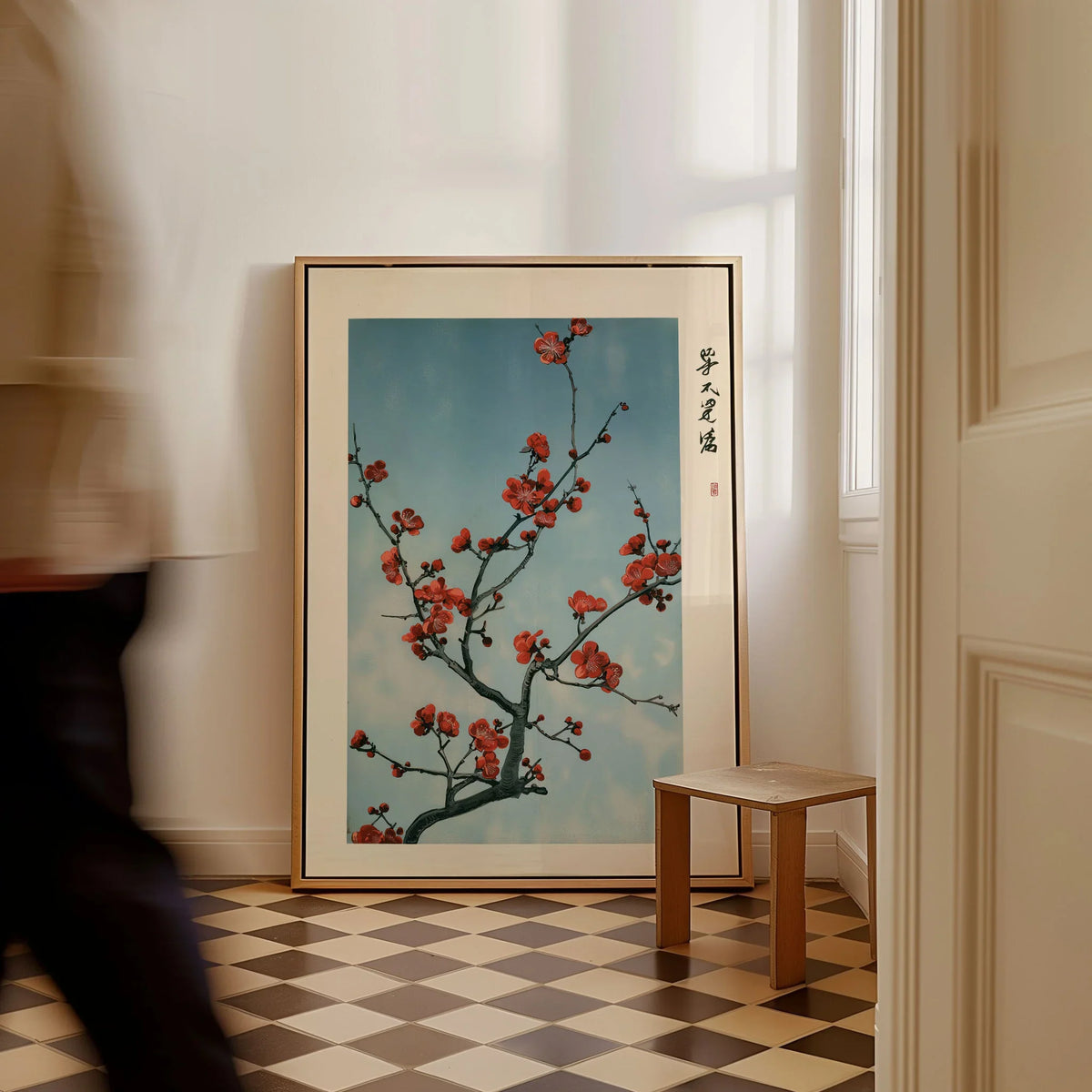 Red Plum Blossom Art Print – Blue Japanese Wall Art — framed canvas on floor man walking past