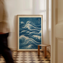 Japanese Waves Wall Art – Vintage Blue Ocean Print — framed canvas on floor man walking past