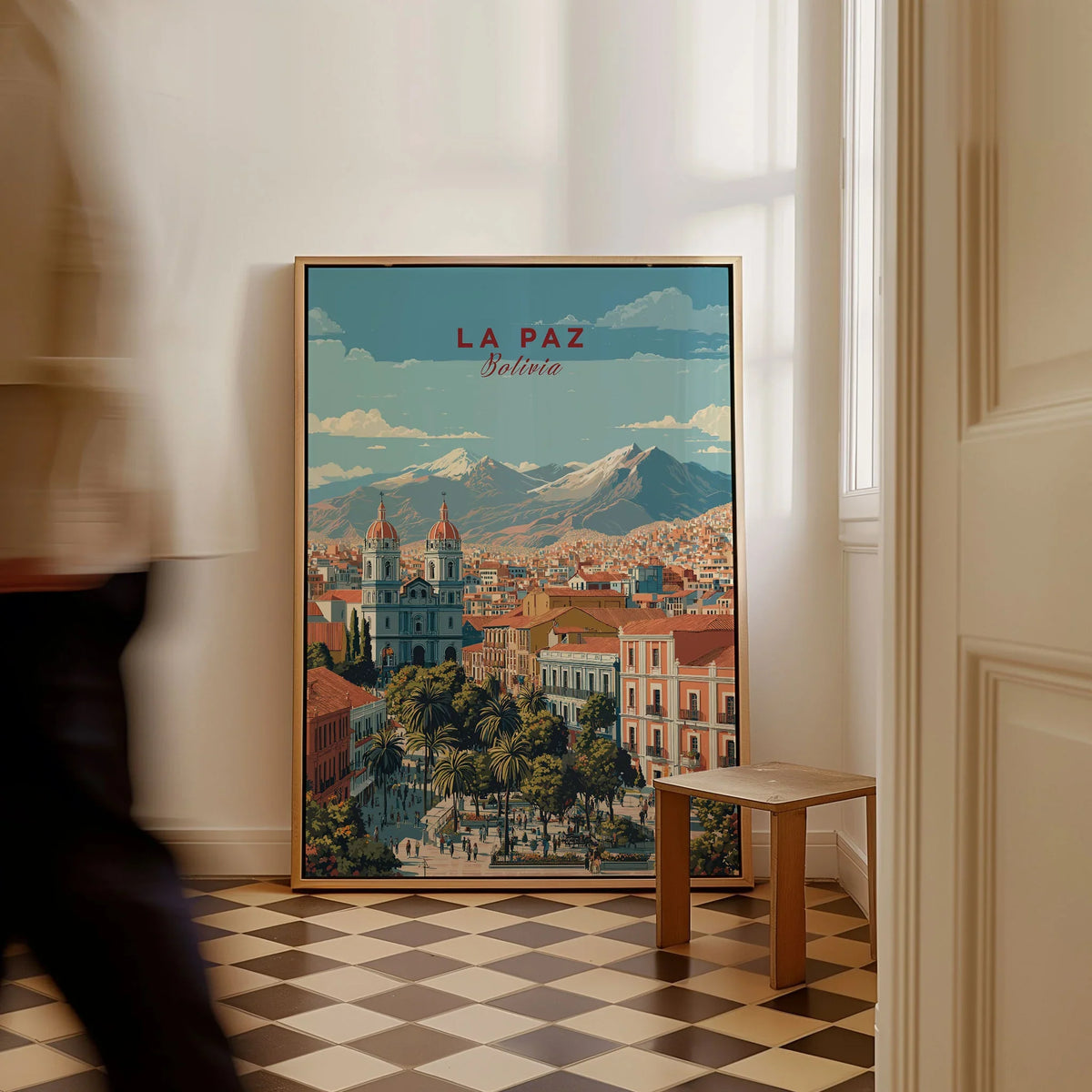 La Paz Travel Print - Bolivia Wall Art as a framed canvas leaning in a hallway with a chequered tiled floor
