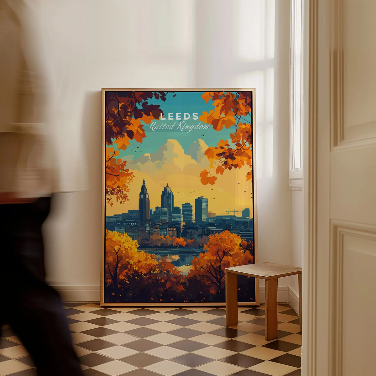 Leeds Wall Art Print - United Kingdom Travel Poster as a framed canvas leaning in a hallway with a chequered tiled floor