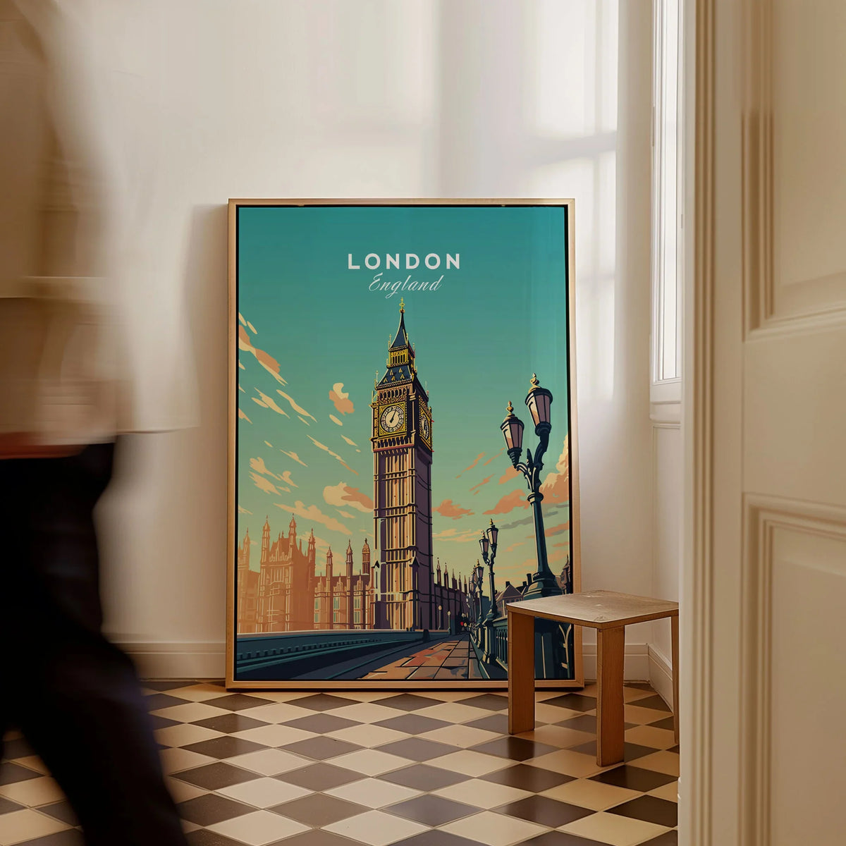 London Poster Big Ben as a framed canvas leaning in a hallway with a chequered tiled floor