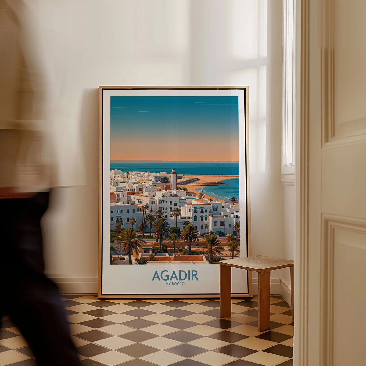 Agadir Morocco Wall Art – Mediterranean Canvas Art as a framed canvas leaning in a hallway with a chequered tiled floor