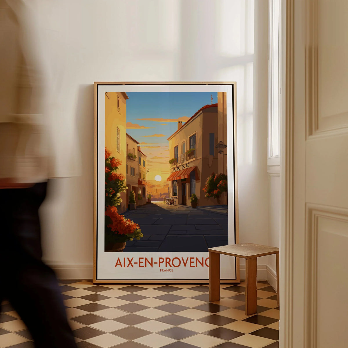 Aix-en-Provence Wall Art as a framed canvas leaning in a hallway with a chequered tiled floor
