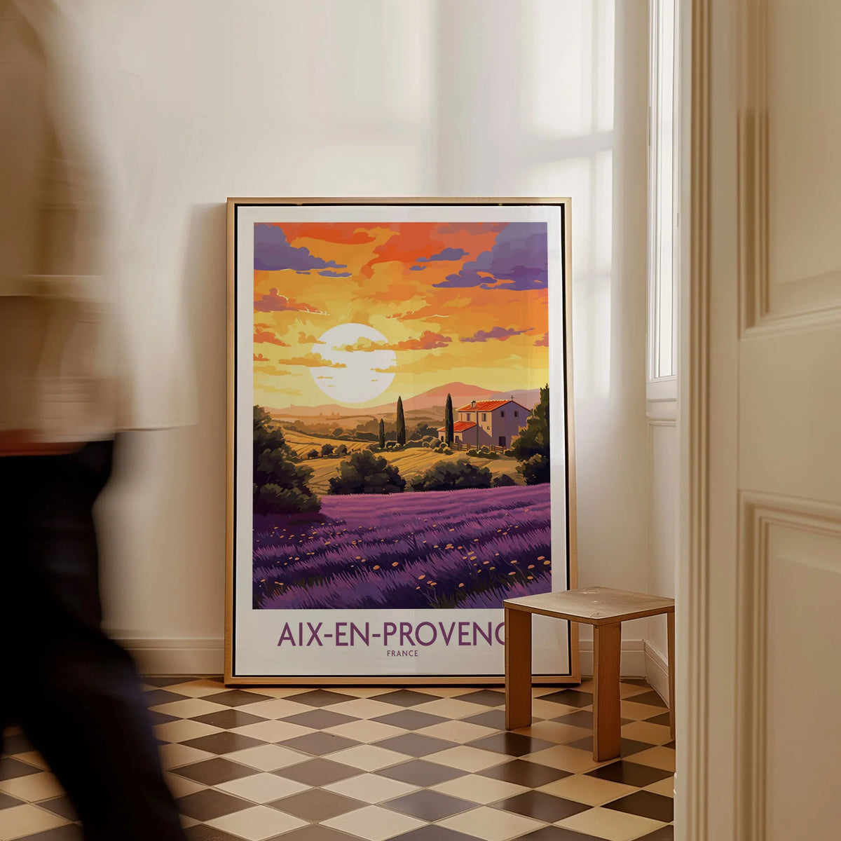 Aix-en-Provence Art Print as a framed canvas leaning in a hallway with a chequered tiled floor