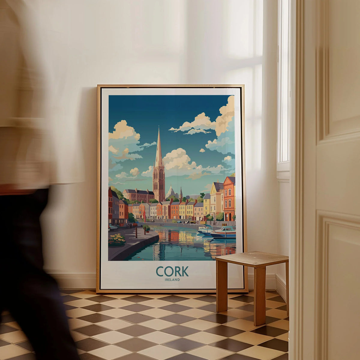 Cork Ireland Poster as a framed canvas leaning in a hallway with a chequered tiled floor