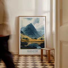 Glencoe Travel Poster as a framed canvas leaning in a hallway with a chequered tiled floor