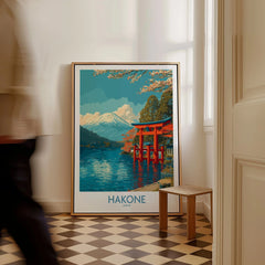 Hakone Wall Art Japan Red Torii Gate Poster as a framed canvas leaning in a hallway with a chequered tiled floor