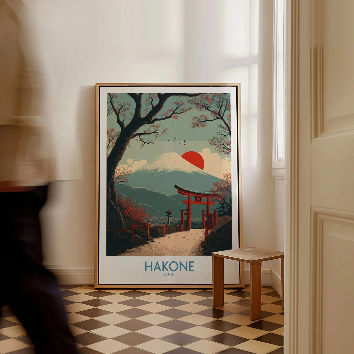 Hakone Japan Peace Gate Shrine Wall Art - Autumn Cherry Blossom Decor as a framed canvas leaning in a hallway with a chequered tiled floor