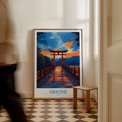 Hakone Wall Art - Japan Travel Poster as a framed canvas leaning in a hallway with a chequered tiled floor