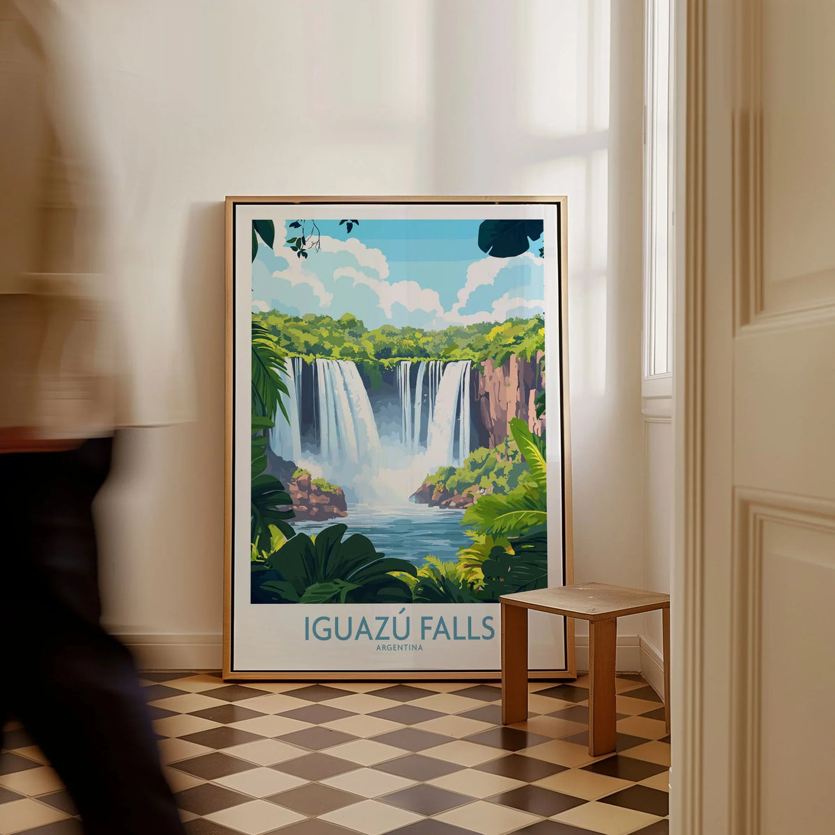 Iguazu Falls Travel Poster as a framed canvas leaning in a hallway with a chequered tiled floor