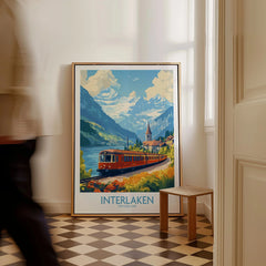 Interlaken Travel Poster as a framed canvas leaning in a hallway with a chequered tiled floor