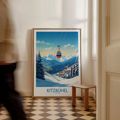 Kitzbuhel Wall Art Print as a framed canvas leaning in a hallway with a chequered tiled floor