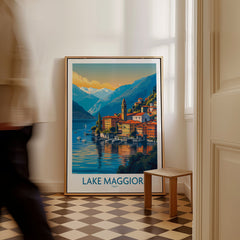 Lake Maggiore Italy Poster as a framed canvas leaning in a hallway with a chequered tiled floor