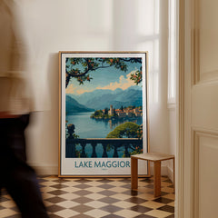 Lake Maggiore Poster Italy as a framed canvas leaning in a hallway with a chequered tiled floor