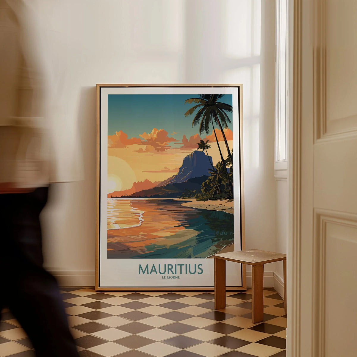 Le Morne Mauritius Wall Art as a framed canvas leaning in a hallway with a chequered tiled floor