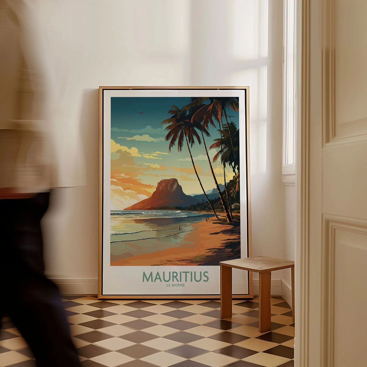 Mauritius Le Morne Print as a framed canvas leaning in a hallway with a chequered tiled floor