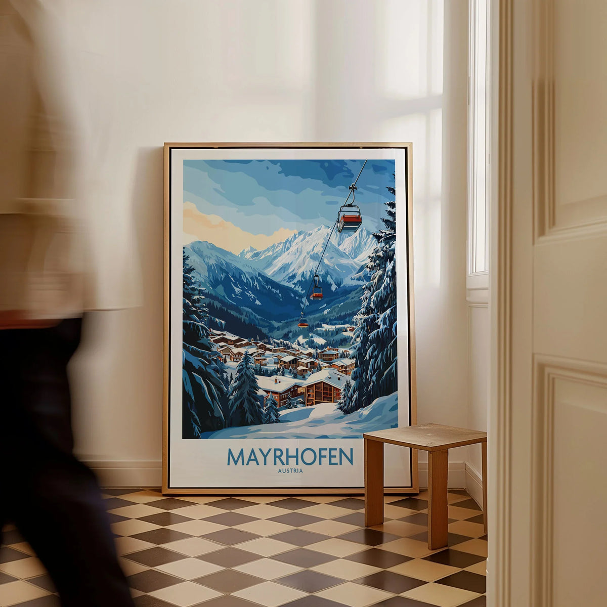 Mayrhofen Ski Poster as a framed canvas leaning in a hallway with a chequered tiled floor