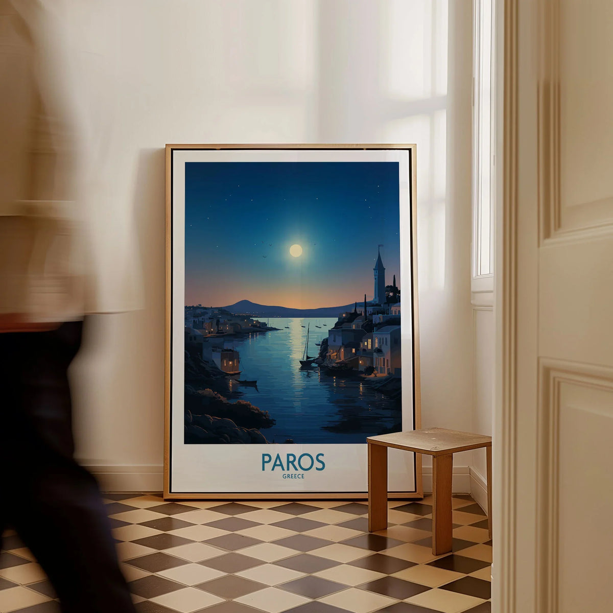 Paros Poster Greece as a framed canvas leaning in a hallway with a chequered tiled floor