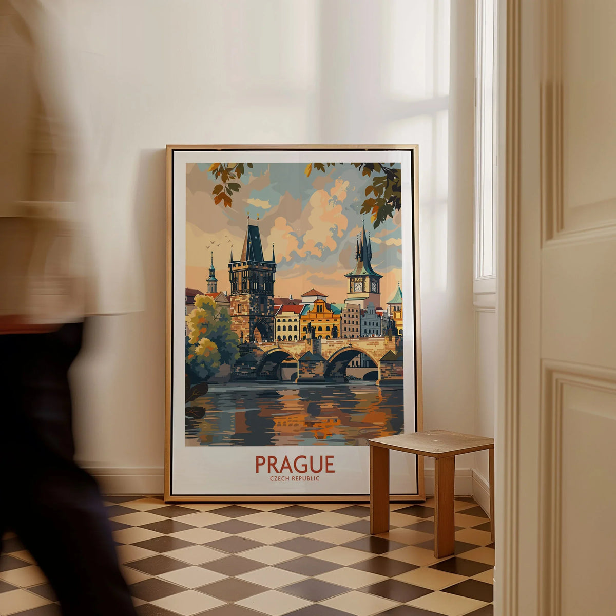 Prague Travel Poster as a framed canvas leaning in a hallway with a chequered tiled floor
