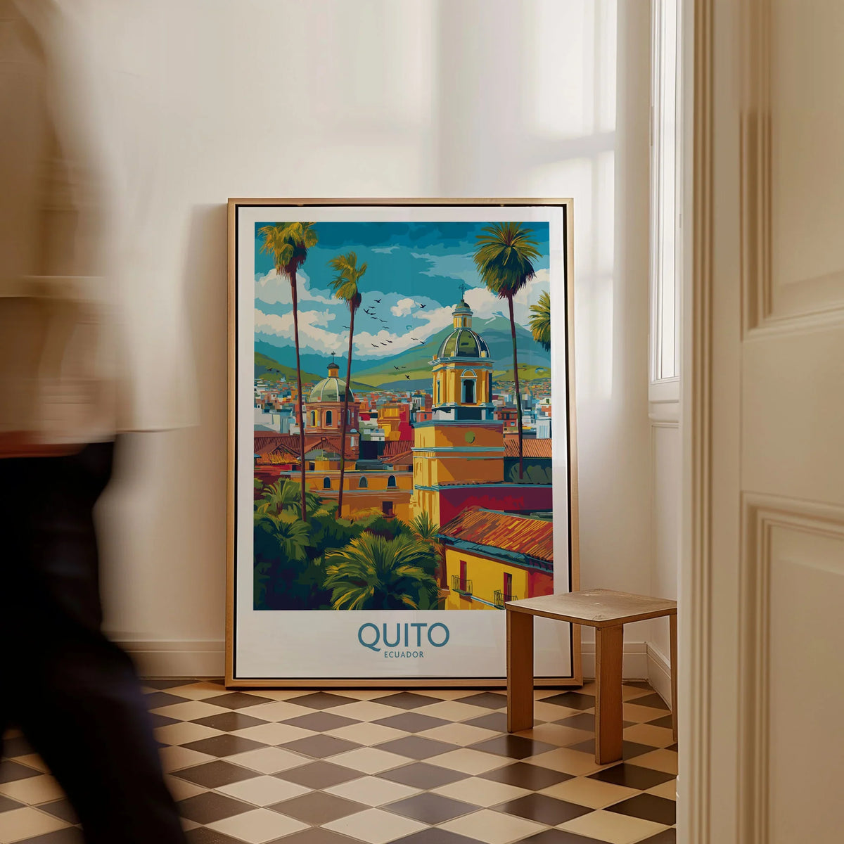 Ecuador Quito Cityscape Travel Print Poster Colonial Churches Andes Mountain Wall Art as a framed canvas leaning in a hallway with a chequered tiled floor