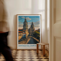 Santiago de Compostela Pilgrimage End Art Print | Cathedral Facade Poster as a framed canvas leaning in a hallway with a chequered tiled floor