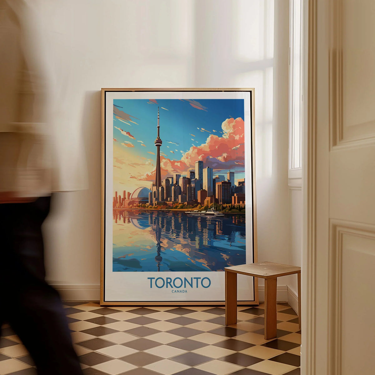 Toronto Wall Art Print as a framed canvas leaning in a hallway with a chequered tiled floor