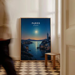Paros Greece Print as a framed canvas leaning in a hallway with a chequered tiled floor