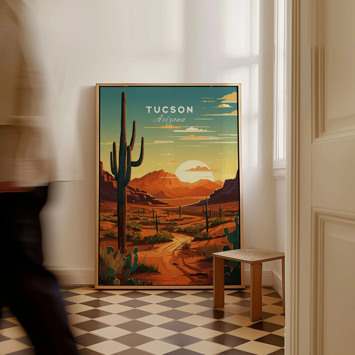 Tucson Arizona Poster as a framed canvas leaning in a hallway with a chequered tiled floor