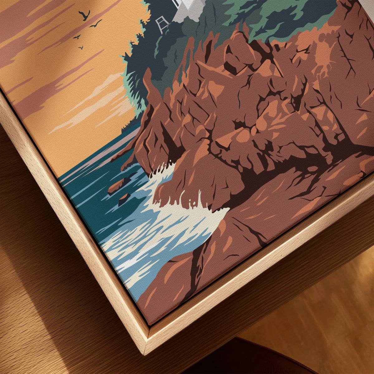 Close-up of coastal landscape wall art print with natural wood floating frame