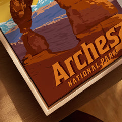 Arches National Park travel poster closeup in a natural wood floating frame