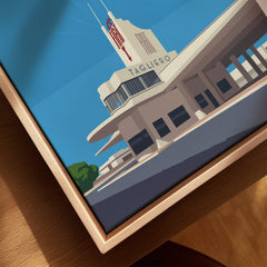 Asmara Travel Poster – Fiat Tagliero Futurist Architecture Art Print showcasing the iconic Tagliero building in vibrant colors.