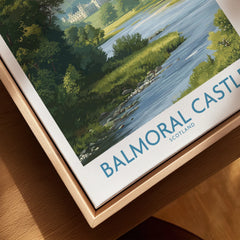 Close-up of Balmoral Castle art print in natural wood floating frame, scenic landscape design