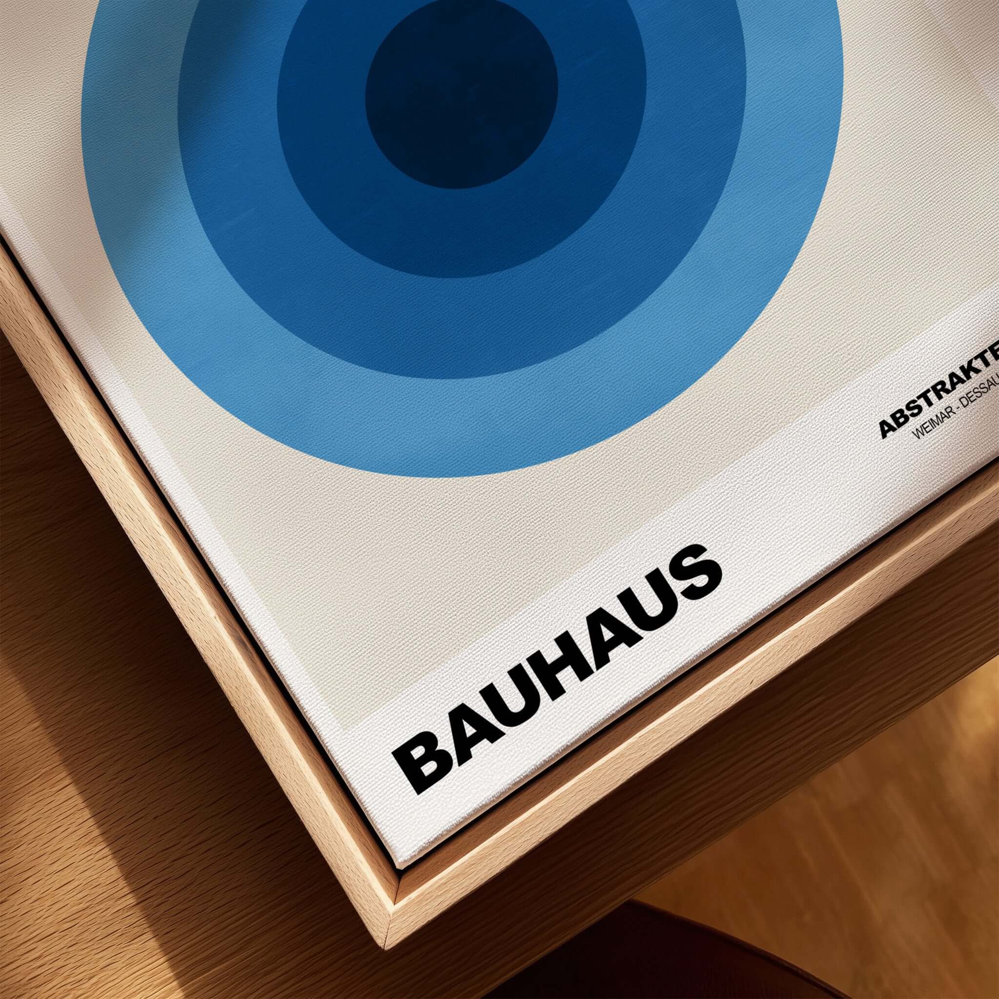 Bauhaus Exhibition Prints - Abstract Blue Circles Poster Geometric Design displayed in a frame with blue concentric circles.
