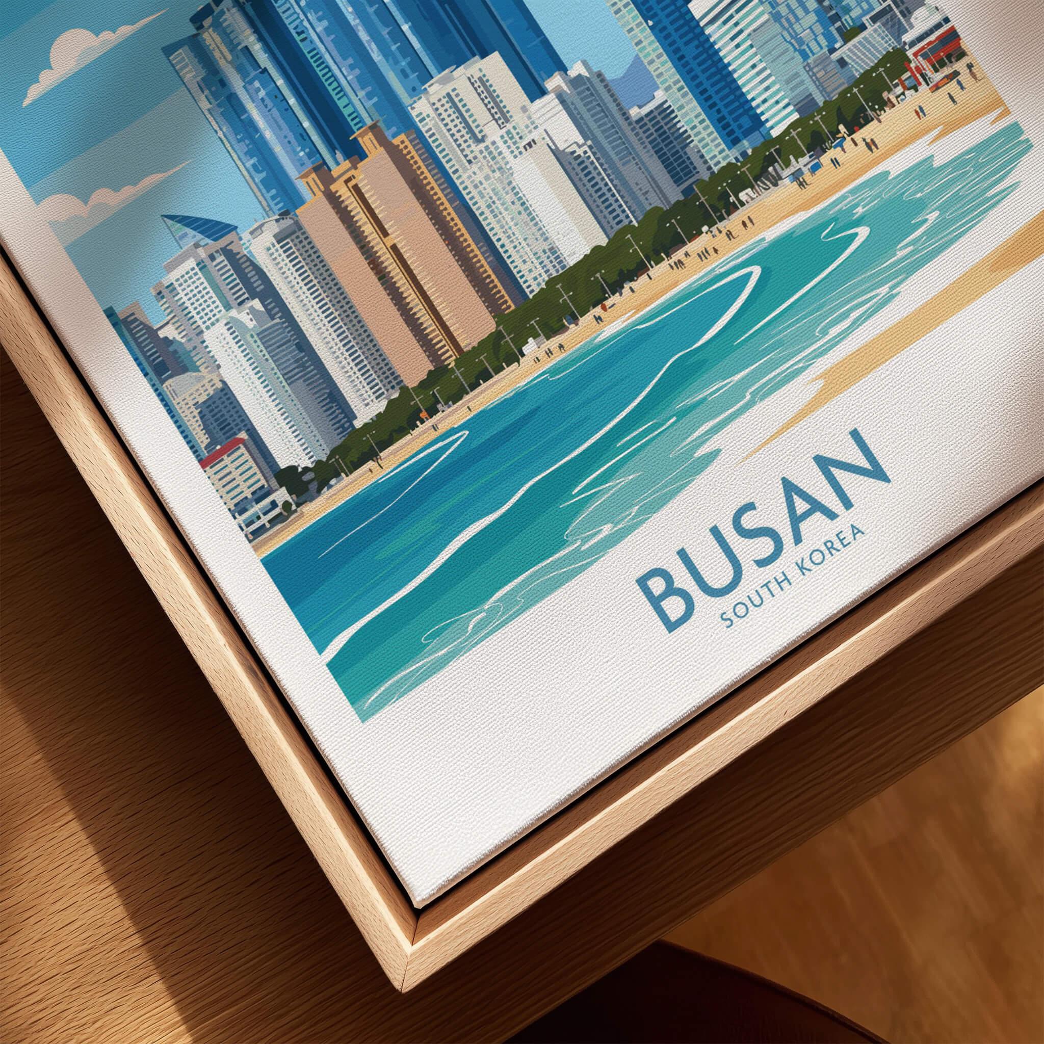 Framed canvas wall art of Busan skyline and beach in natural wood floating frame