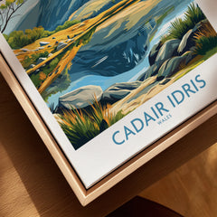 Close-up of Cadair Idris Wales travel poster on canvas in natural wood floating frame