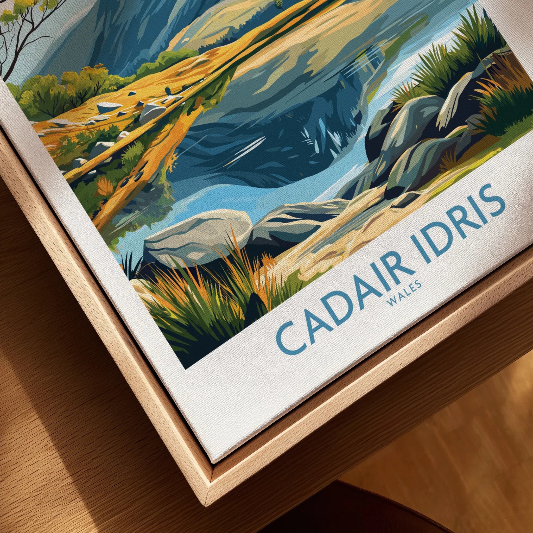 Close-up of Cadair Idris Wales travel poster on canvas in natural wood floating frame