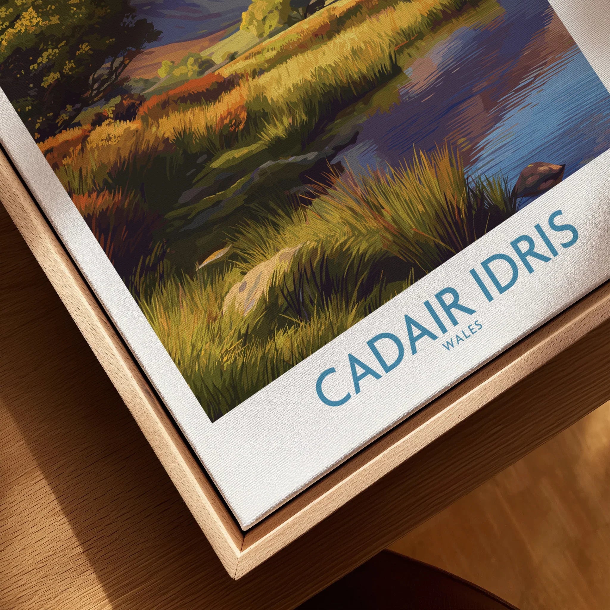 Closeup of Cadair Idris Wales travel art print in natural wood floating frame