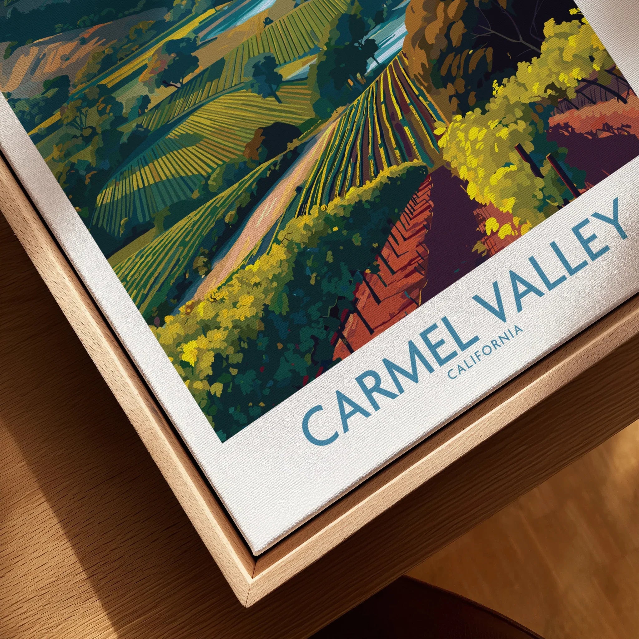 Close-up of Carmel Valley California travel poster in natural wood floating frame