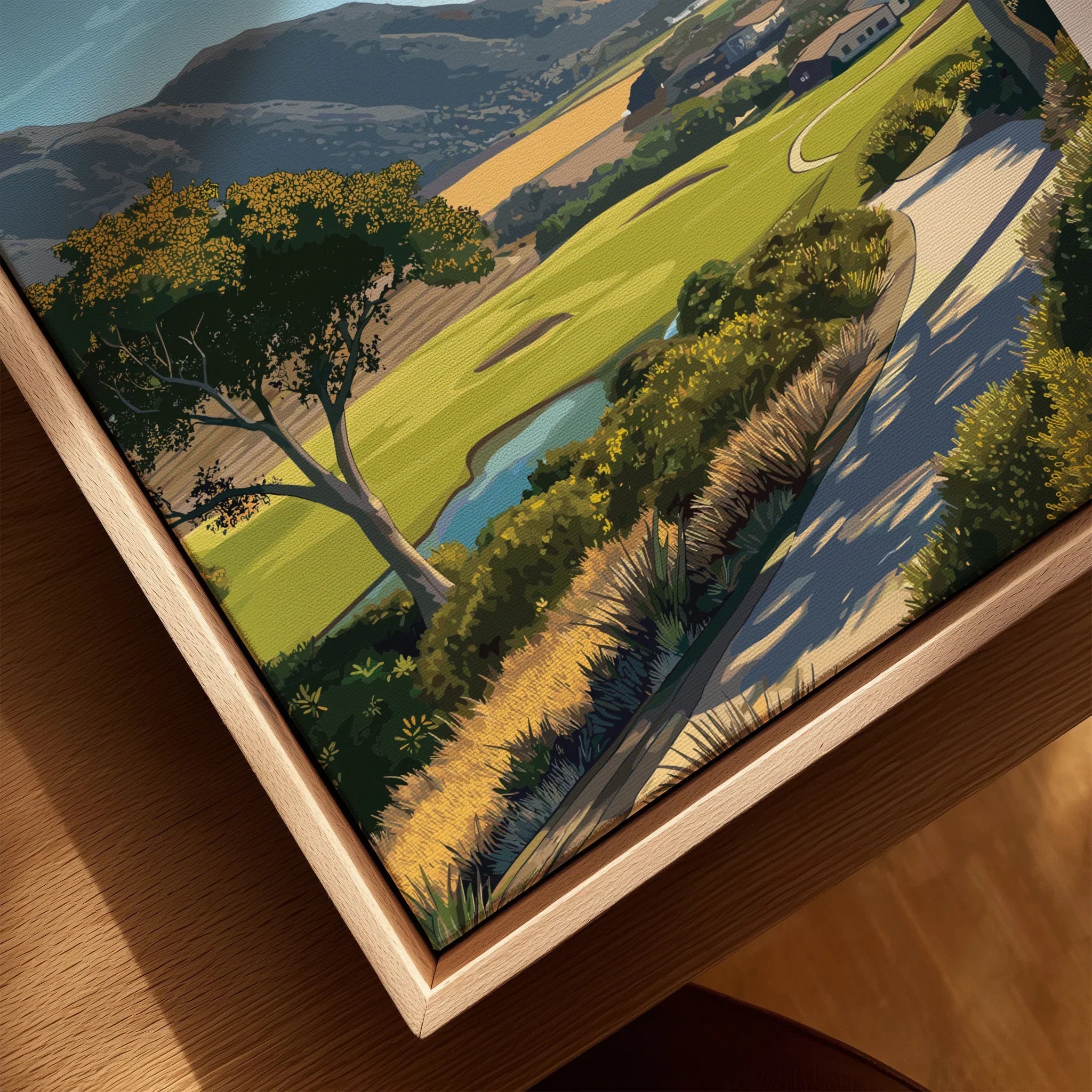 Close-up of framed landscape wall art print featuring Carmel Valley scenery in natural wood