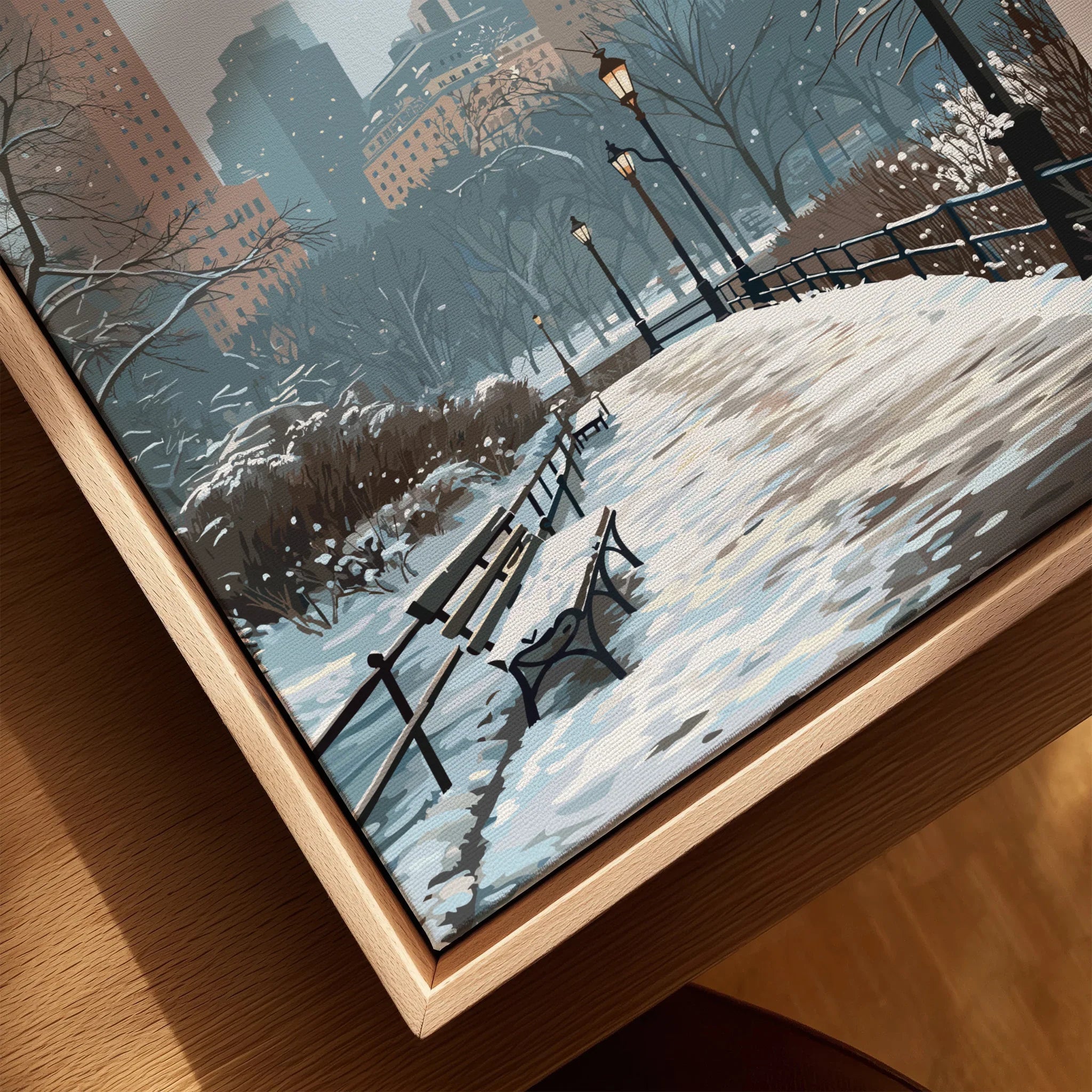 Closeup of framed canvas wall art featuring Central Park in winter with snow and city skyline.